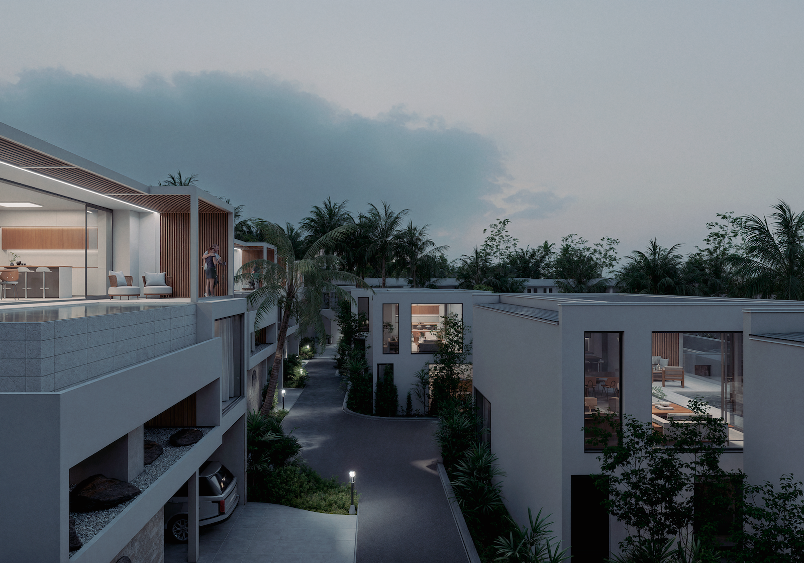 IO Villas — villa facade with balcony and tropical garden at dusk