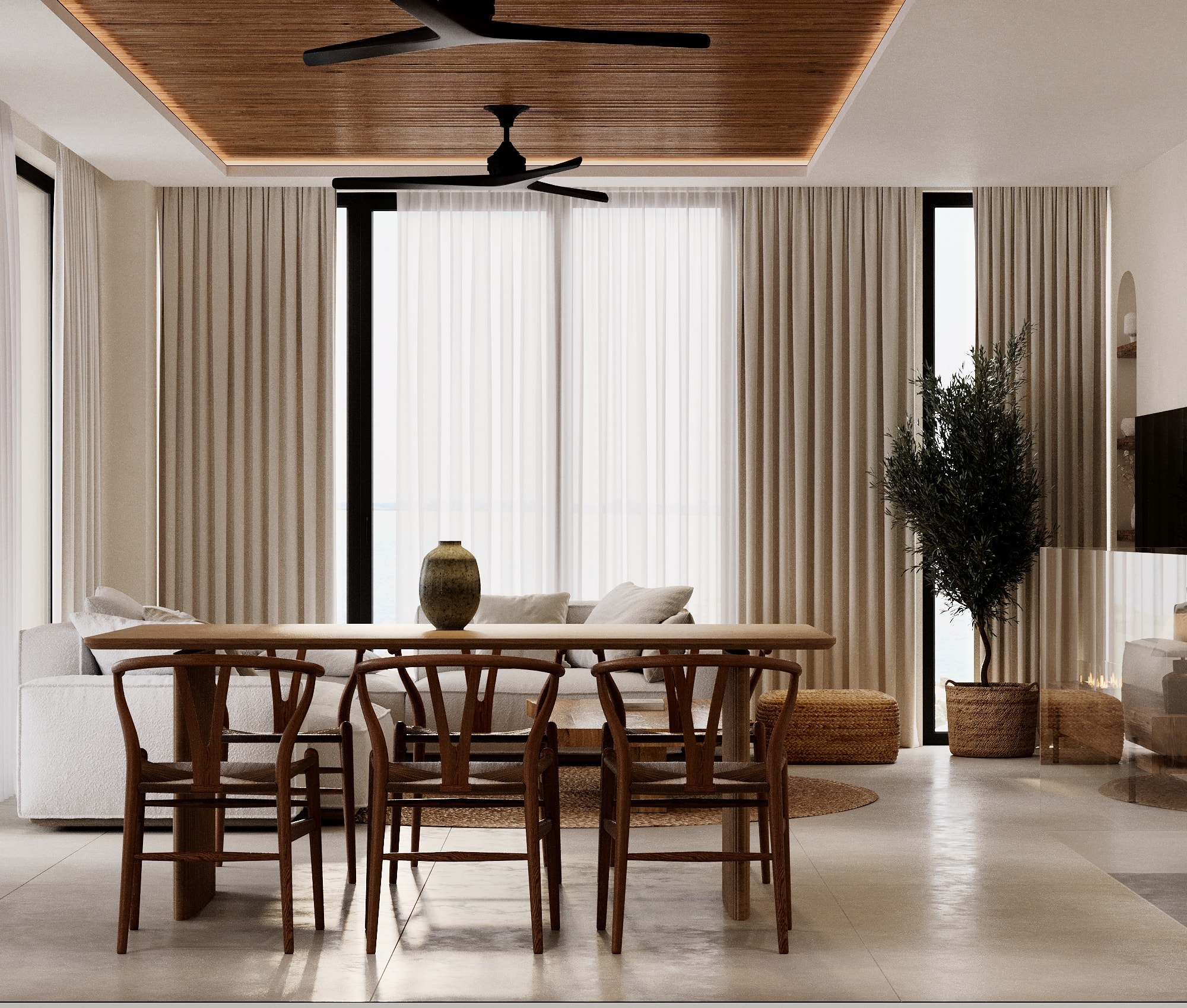 IO Villas — dining area with wishbone chairs and floor-to-ceiling curtains